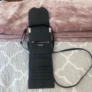 Black leather Peru bag by Henri Bendel